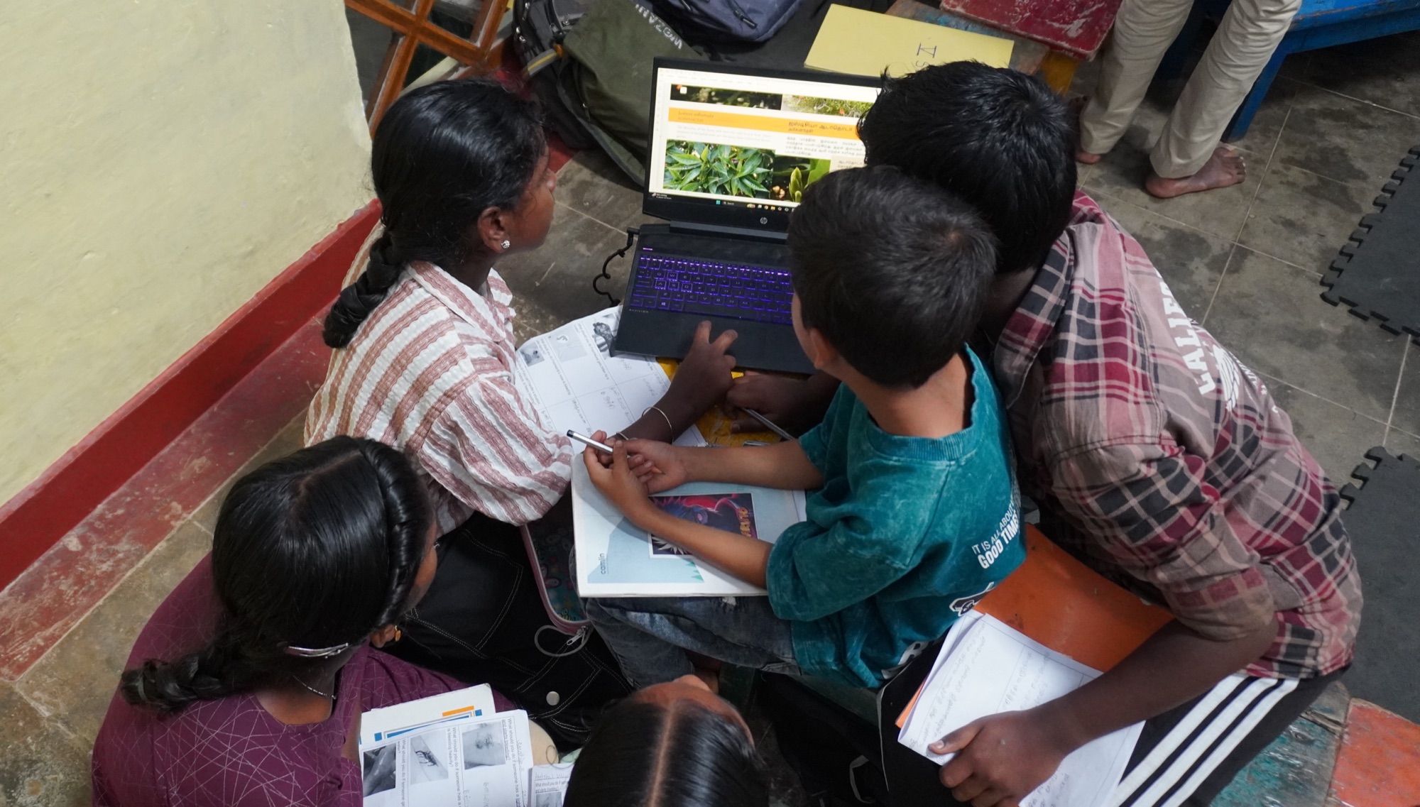 Adivasi children at work at their desks at Vidyodaya School
