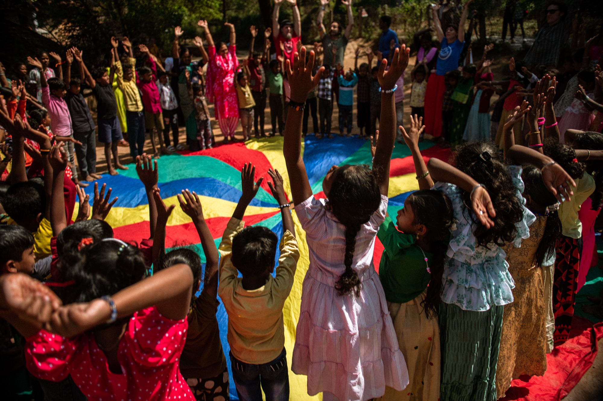 Children playing energetically outdoors